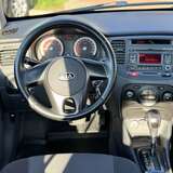 Kia Rio 1.4 AT (97 л.с.) Luxe