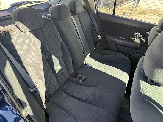 Nissan Tiida 1.6 MT (110 л.с.) Comfort