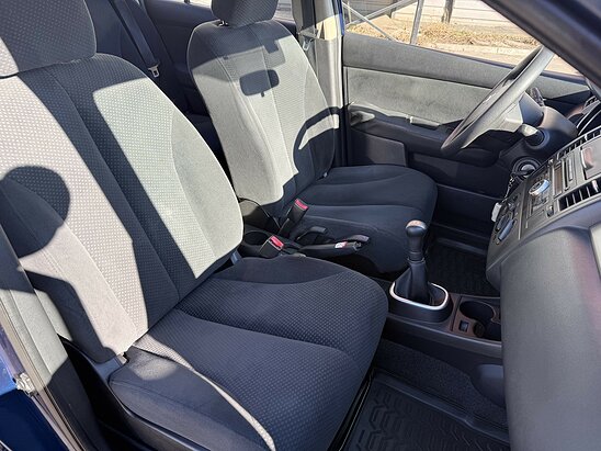 Nissan Tiida 1.6 MT (110 л.с.) Comfort
