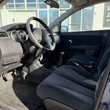 Nissan Tiida 1.6 MT (110 л.с.) Comfort