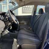 Nissan Tiida 1.6 MT (110 л.с.) Comfort