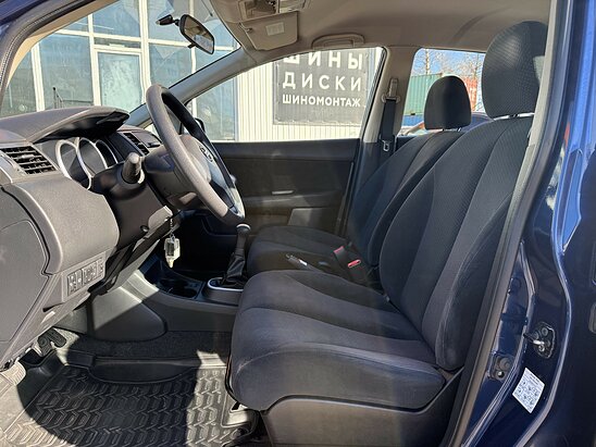 Nissan Tiida 1.6 MT (110 л.с.) Comfort