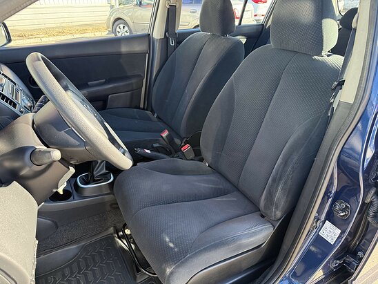 Nissan Tiida 1.6 MT (110 л.с.) Comfort
